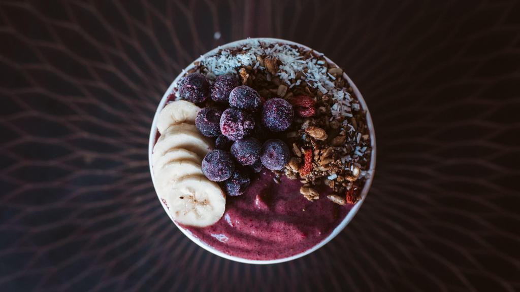 Acai Bowl · Acai, strawberries, banana, coconut water topped with gluten-free granola, blueberries, banana, and coconut flakes.