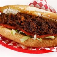 Number One Son · Smoked, chopped beef, bbq sauce, lettuce, tomato & mayo. Choice side slaw or creole potato s...