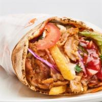 Spicy Chicken Shawarma Wrap · Fresh halal chicken shawarma with spices, hummus, lettuce, tomatoes, red onions, pickles, cu...