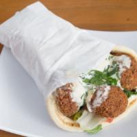 Vegetarian Gyro · Chef's special falafels made with grilled onions, peppers, mushrooms, lettuce, tomatoes, oli...