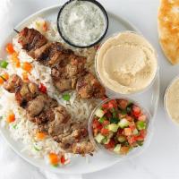 Chicken Kabob Platter · Halal, gluten-free. Slowly grilled tender and juicy chicken skewers (2) marinated in our hou...