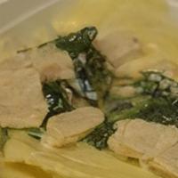Green Ravioli · Tender pasta squares with Ricotta, spinach, special herbs & Mozzarella cheese.