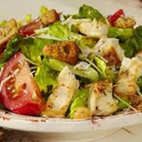 Caesar Salad · Crisp lettuce, tomatoes, red onions, red cabbage, pepperoncini, black olives, Parmesan chees...