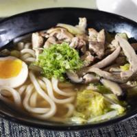 Chicken Udon/D · Chicken Breast Strips, Thick Wheat-Flour Noodle, Vegetable and Chopped Green Onion in the Br...