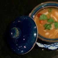 Tom Yum Cup · Hot & sour soup with lemongrass, galangal, mushroom, onions and tomatoes
