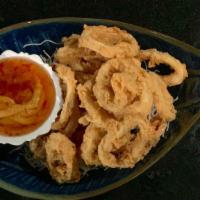 Crispy Calamari · Fried and crisp calamari ring in salt and pepper batter served with salted egg cream sauce