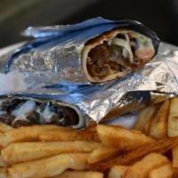 Lamb Gyro Plate · Serving plate of food.