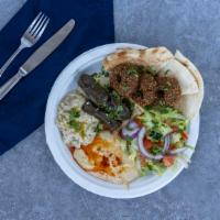 Vegie Combo Plate · Hummus, baba ganoush, dolmeh, falafel and tabbouleh.