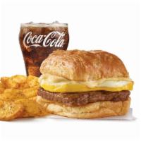 Sausage, Egg & Cheese Biscuit Combo · A fresh-cracked grade A egg on a fluffy buttermilk biscuit with grilled sausage and melted A...