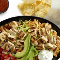 Double Chicken Bowl · Double up on a double portion of delicious citrus-marinated chopped chicken on top of authen...