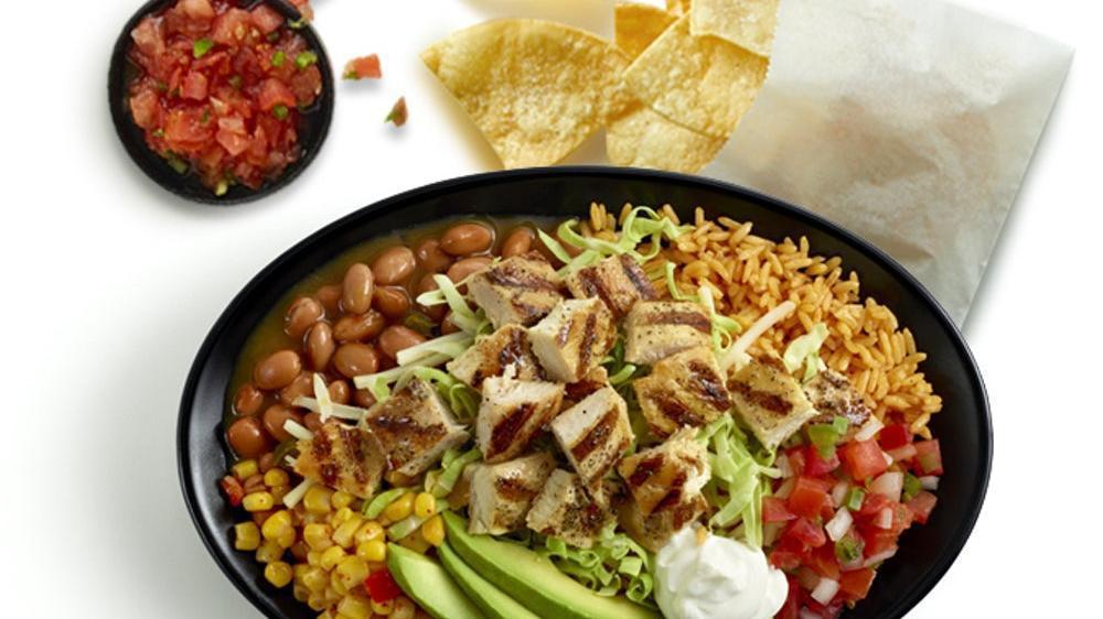 Grande Avocado Chicken Bowl · Ripe avocados with citrus-marinated, fire-grilled chopped chicken, cool sour cream, sweet corn, shredded cheese, cabbage, house-made pico de gallo salsa, rice and pinto beans. . Includes chips and salsa.