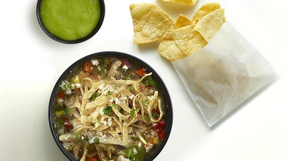 Homemade Tortilla Soup (Large) · A large serving of shredded fire-grilled chicken, roasted corn, celery, carrots, roasted poblano peppers, red bell peppers, green bell peppers, Cotija cheese, cilantro and corn tortilla strips.. Includes chips and salsa.