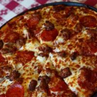 Medium Meat Pizza · Pepperoni, Italian Sausage, Smoked Canadian Bacon, Crispy Bacon.