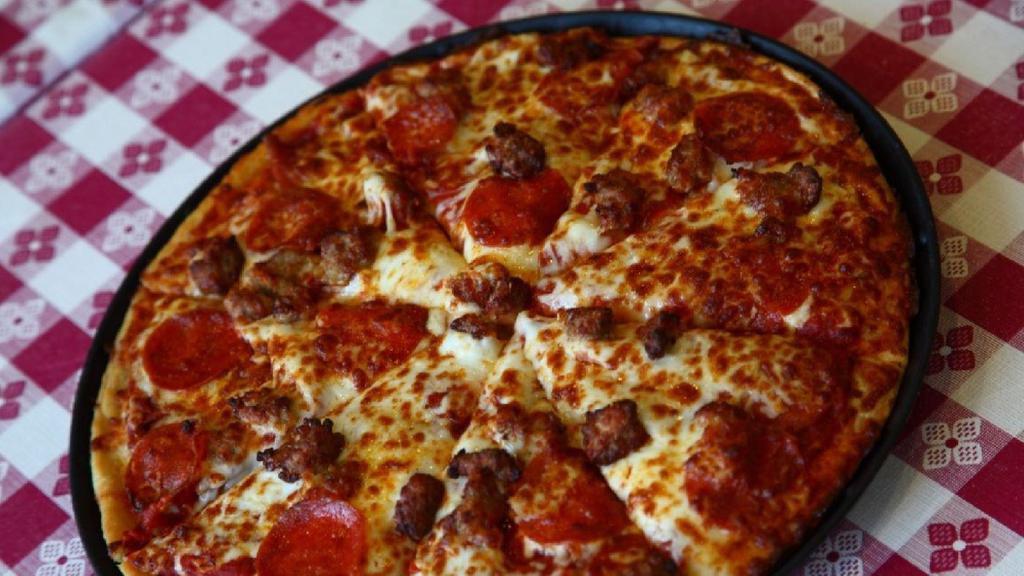 Medium Meat Pizza · Pepperoni, Italian Sausage, Smoked Canadian Bacon, Crispy Bacon.