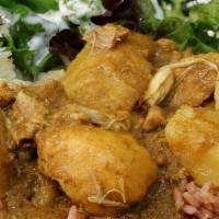 Chicken Curry Salad · Chicken and potato in mild yellow curry. With a large bed of mixed greens topped with cucumb...