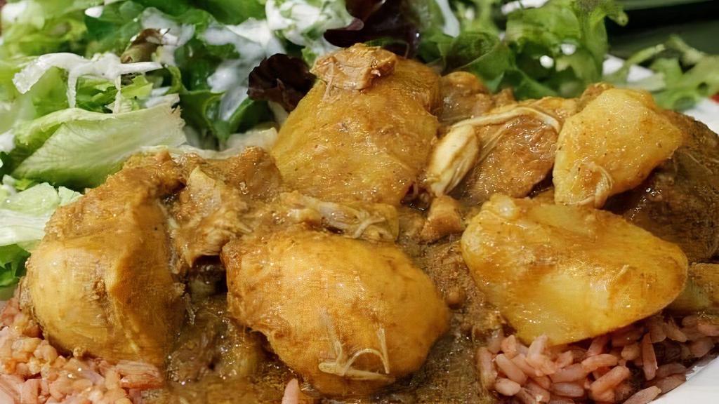 Chicken Curry Salad · Chicken and potato in mild yellow curry. With a large bed of mixed greens topped with cucumbers, tomatoes, black olives, and choice of dressing.