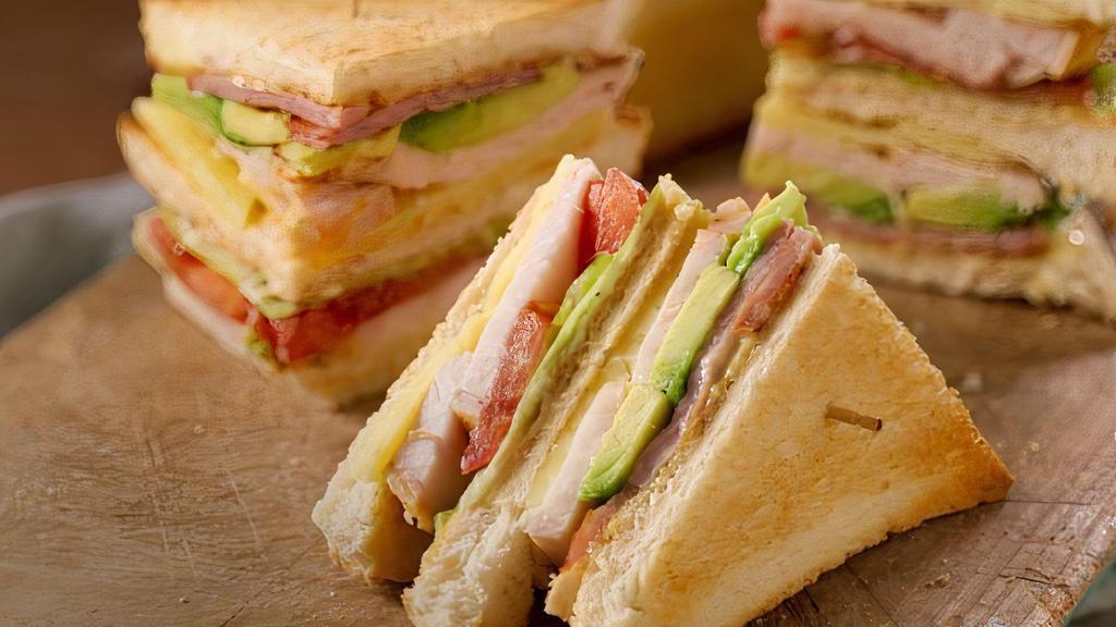 Chicken Club · Grilled chicken, avocado, bacon, lettuce, tomato, and your choice of bread.