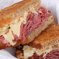 Hot Pastrami Sandwich · Pastrami, Swiss, lettuce, tomato, pickle, mayo, mustard, and your choice of bread.