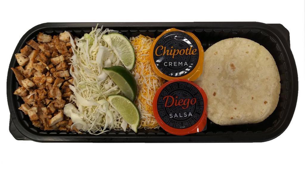 Chicken Street Taco Kit · Diced grilled chicken, flour tortillas, crème packet, salsa packets, three cheese blend, shredded cabbage & lime. Serves 2-4.