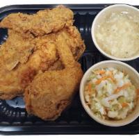 2 Piece Fried Chicken Breast & Wing Meal · Comes with 1 breast, 1 wing and choice of 2 (4 oz.) sides.