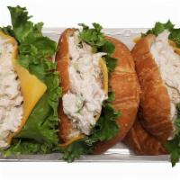 Chicken Salad Croissant Sandwiches, 3 Ct · Store-made rotisserie chicken salad, sliced Cheddar cheese, green leaf lettuce on a mini cro...