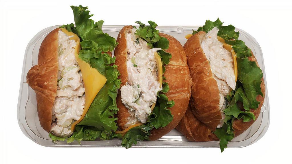 Chicken Salad Croissant Sandwiches, 3 Ct · Store-made rotisserie chicken salad, sliced Cheddar cheese, green leaf lettuce on a mini croissant.