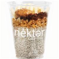 Ab Banana Parfait  · Vanilla Chia Pudding, topped with Hempseed Granola, Almond Butter, Bananas, and Cacao Nibs.