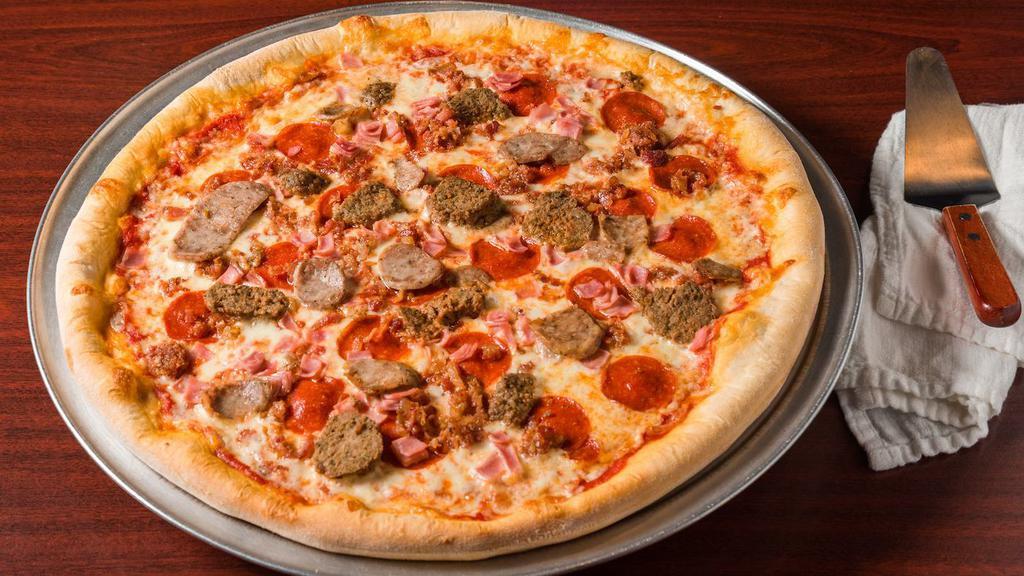 Meat Lovers Pizza · Hand-stretched dough with marinara, mozzarella cheese, pepperoni, ham, bacon, meatball, and sausage.