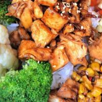Chicken Teriyaki Bowl · House teriyaki sauce with roasted corn, steamed veggies, cucumber salad and house salad on a...