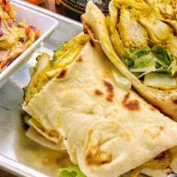 Curry Chicken Wrap · Curry chicken mix on naan bread.