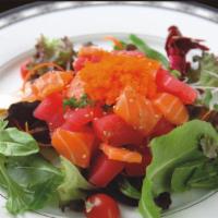 Sashimi Salad · Tuna, salmon, white fish cucumber, daikon, on gourmet spring mix with house and mayo sauce a...