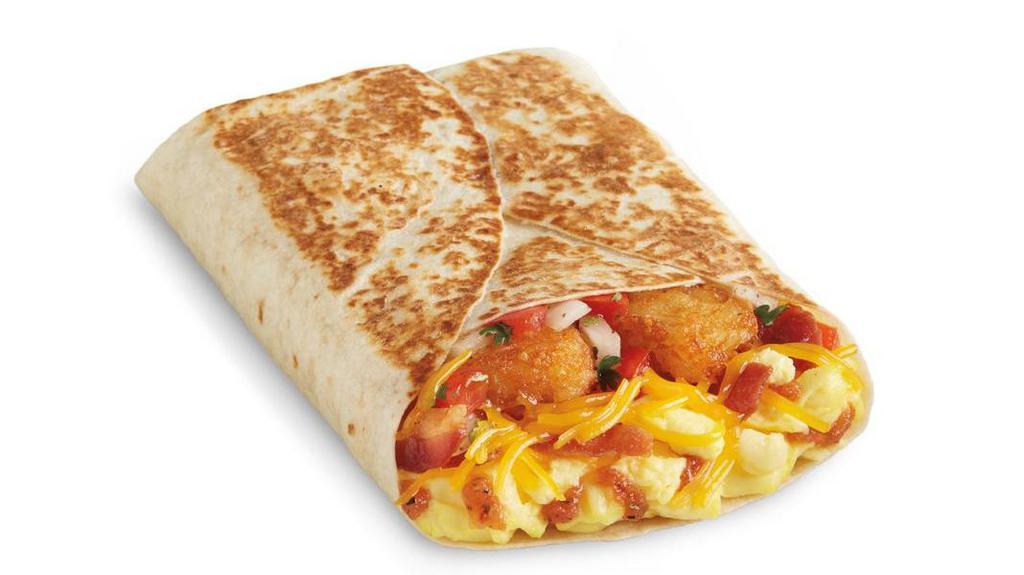Breakfast Toasted Wrap · Scrambled eggs, hashbrown sticks, freshly grated cheddar cheese, pico de gallo, signature tangy Salsa Casera, and choice of egg & cheese, crispy bacon or freshly grilled carne asada, wrapped in a warm flour tortilla.