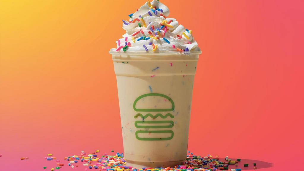 Sprinkle Cookie Shake · Cookie butter frozen custard hand spun with rainbow crispies and topped with whipped cream and sprinkles - 3% of sales benefit The Trevor Project