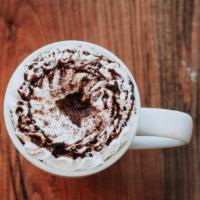 Mocha Thai · Mexican hot chocolate, two shots of espresso, and a squeeze of sweetened condensed milk.

*c...