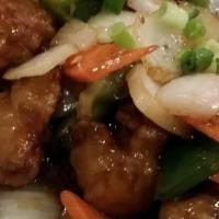 Manchurian Chicken · In a spicy ginger and garlic soy sauce.