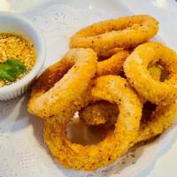 Fried Calamari Strips · Served with sriracha and sweet and sour sauce.
