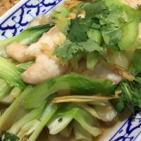 Ginger Fish · Steamed white fish filet with ginger and bok choy.