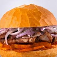 Pan Con Chicharon · Crispy pork belly with  fried sweet potato and onion lime salad