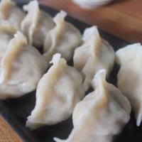 Pork & Chinese Cabbage Dumplings · 10 PCS.