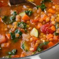 Lentil Soup · A mix of carrots, leeks, garlic, onions, celery, and lentils slowly cooked in a chicken brot...