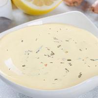 Maust Mousier · Creamy plain yogurt mixed with minced shallots.