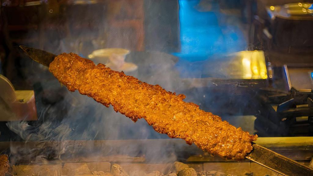 Chicken Koobideh · Most popular. Two skewers of ground chicken seasoned with special seasonings and charbroiled. Entrées served with basmati rice, topped with saffron and a charbroiled tomato.