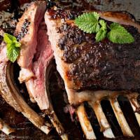 Rack Of Lamb · Herb-marinated tender rack of lamb grilled over an open fire.