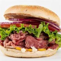 Pastrami Bagel Sandwich · Delicious, thinly sliced lean pastrami. Served with mayo, mustard, lettuce, tomato, onion, a...