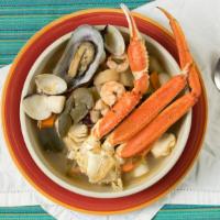 Siete Mares · Seafood soup that includes shrimp, fish, baby scallops, clams, octopus, mussels, and crab le...