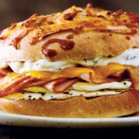 Farmhouse · Cheesy Hash Brown Gourmet Bagel with bacon, ham, cheddar cheese, a country pepper shmear.