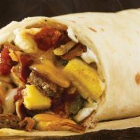 Big Breakfast Burrito · Cage-Free Eggs, Turkey-Sausage, Bacon, Melted Cheese, Green Chiles, Hash Browns, Salsa and P...