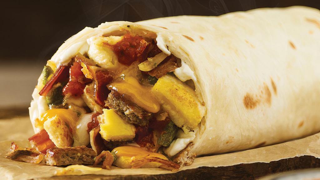 Big Breakfast Burrito · Cage-Free Eggs, Turkey-Sausage, Bacon, Melted Cheese, Green Chiles, Hash Browns, Salsa and Plain Shmear in a Flour Tortilla.