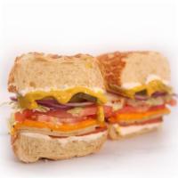Inner Master | Club · Classic Club Sandwich stacked with turkey-free, ham-free, cheddar cheese, lettuce, red onion...