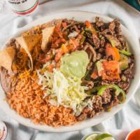 #13. Steak Ranchero · Steak W/ Fajitas (Bell Pepper, Onion, Tomato) Guacamole, Mexican Salsa, Lettuce, Beans, Rice...